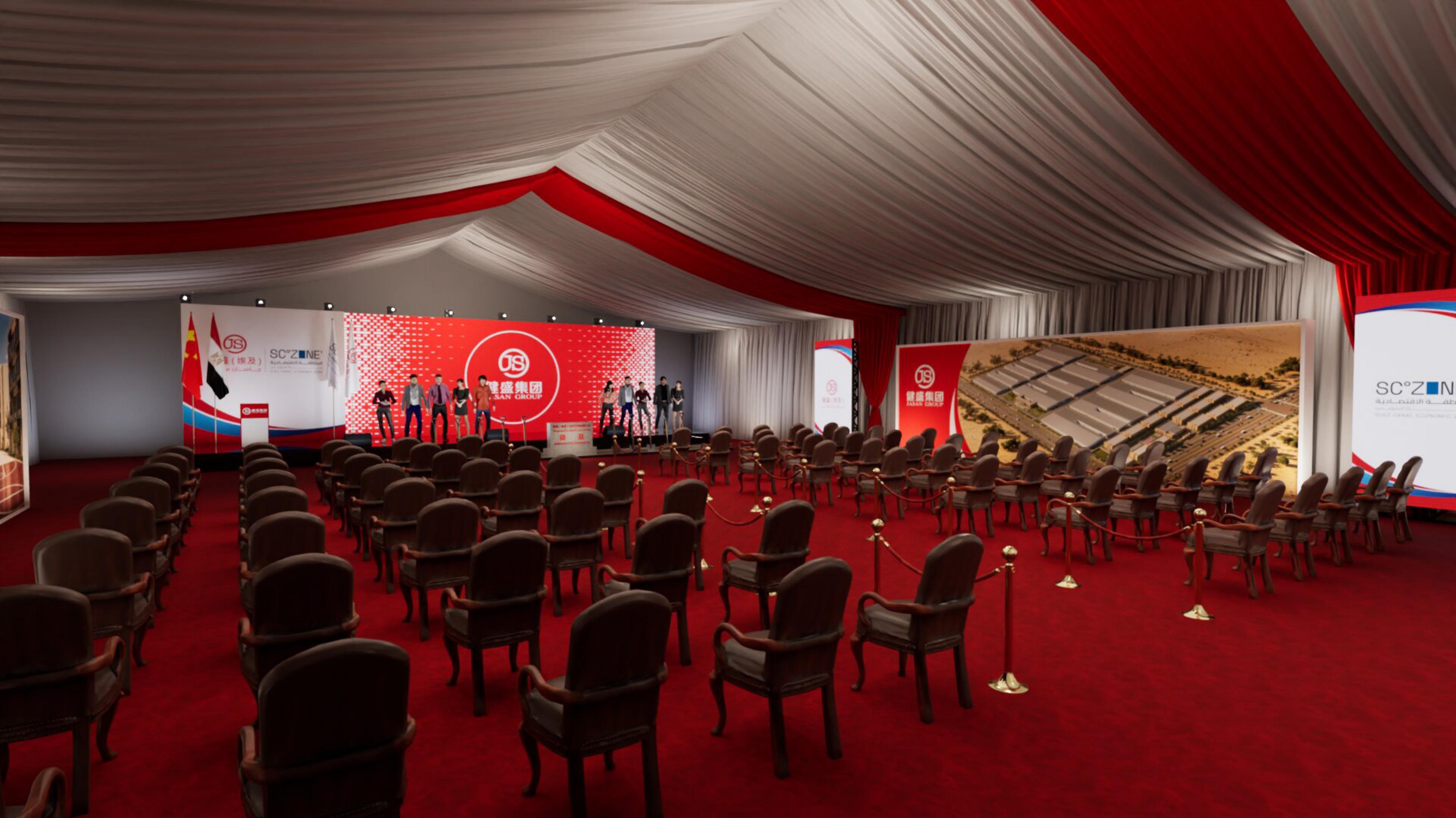 Covered tent interior — illuminated circular JS emblem wall, banner totems and seating