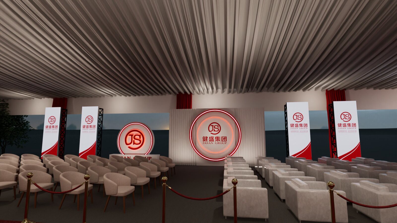 Open tent interior — circular JS emblem backdrop with lounge seating